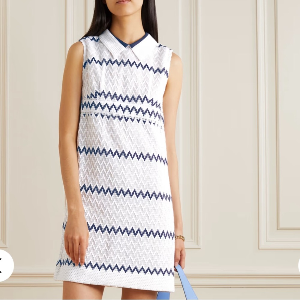 Rare find Rue Mariscal's mini dress is cut from cotton and hand-embroidered .